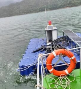 Use a boat to tow the float platform to the designated latitude and longitude position.
